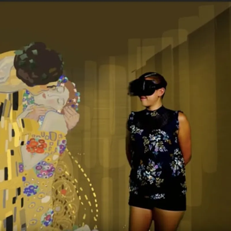 Estella Tse: in a VR headset beside a VR rendition of Klimt’s The Kiss