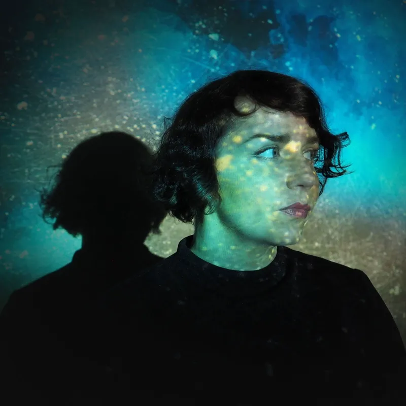 Heather Dunaway Smith: portrait under a projection of stars